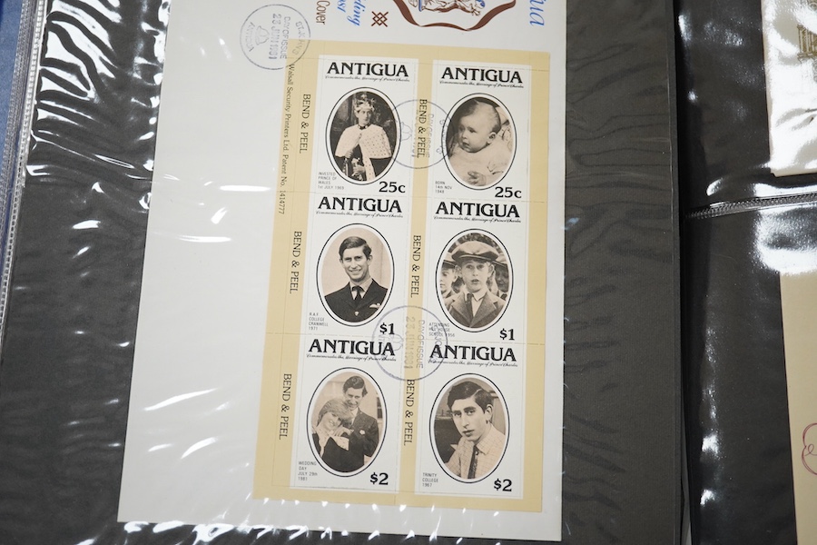 A box containing eight modern stamp albums